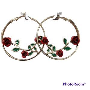 Gold hoop earrings with two stemmed red roses in the middle.  Nickle fr…